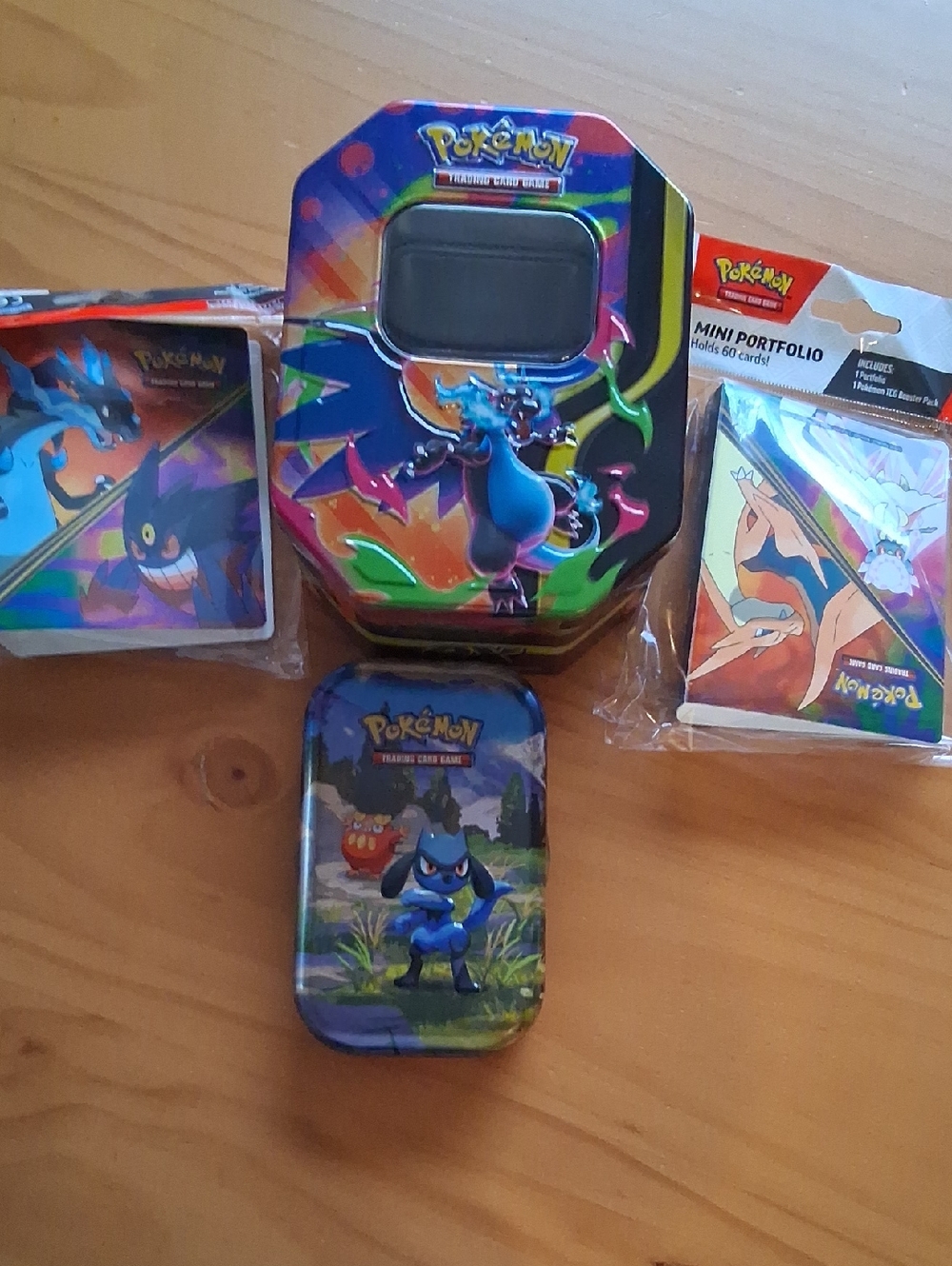 Pokemon Tin Set with Blue, Green, Purple, Red Artwork